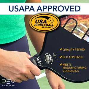Player holding the USAPA-approved REV NEBULA pickleball paddle