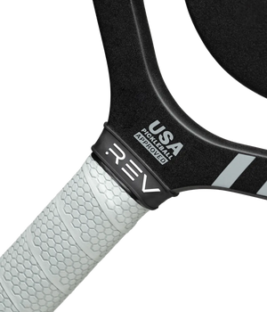 Close-up of USA Pickleball Approved seal on the REV Platinum pickleball paddle